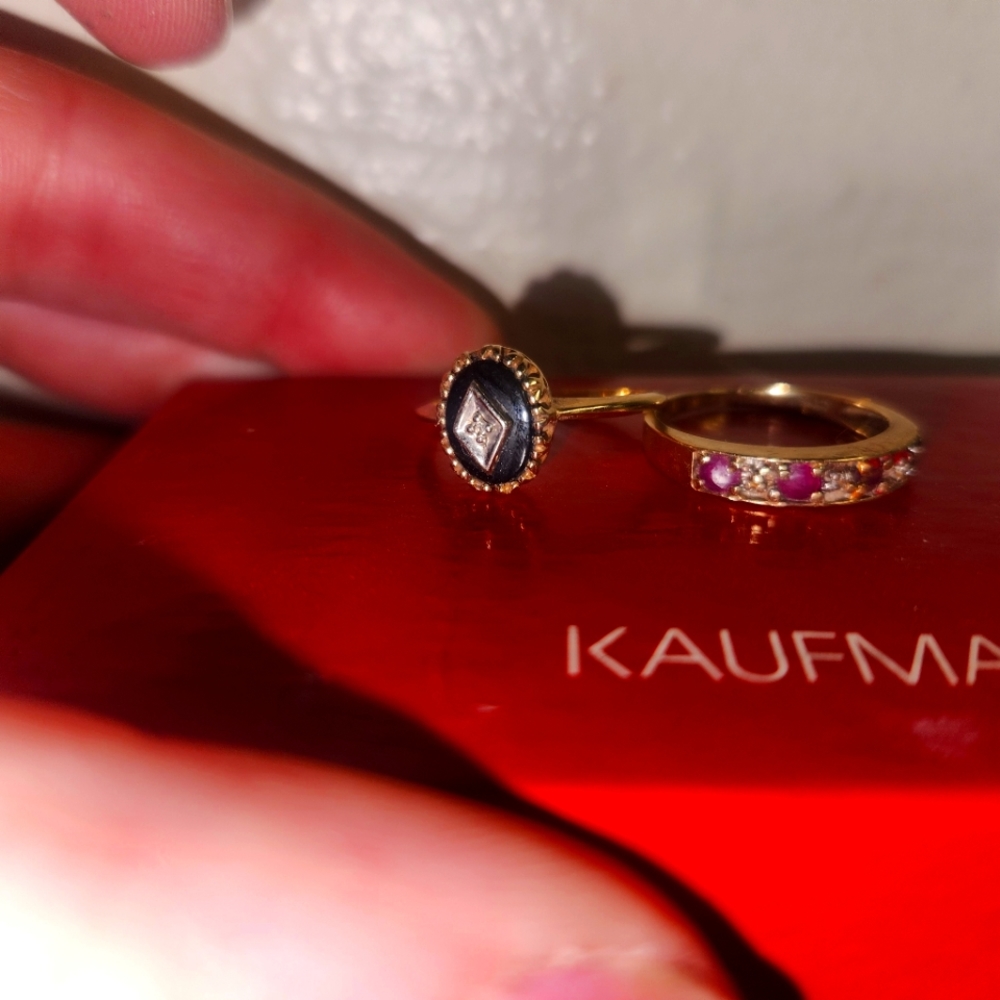 Two 10 karat gold size 7 rings